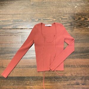 Stylish burgundy colored sexy knit top